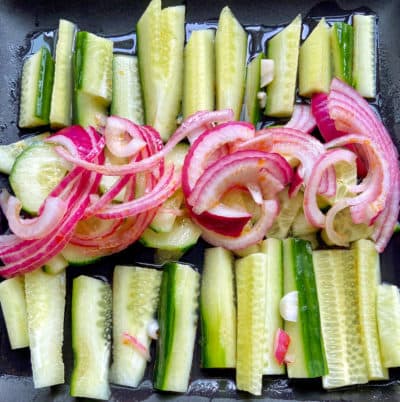 Cucumber and pickled red onion salad with spicy sesame oil. (Kathy Gunst/Here &amp; Now)