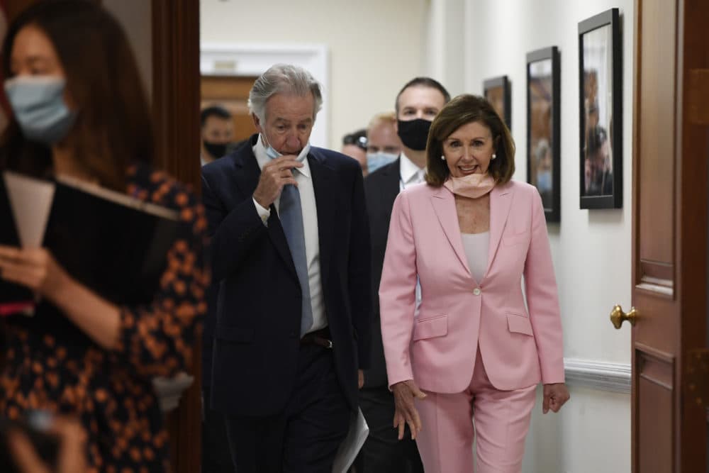 House Speaker Nancy Pelosi and Rep. Richard Neal on their way to promote the Moving Forward Act, June 18, Washington. (AP Photo/Susan Walsh)
