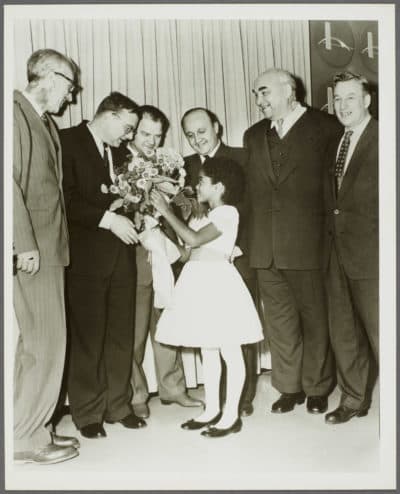 Virginia Kay presenting flowers to composer Dmitri Shostakovich upon his return from a State Department trip to the Soviet Union with her father in 1959. (Courtesy Rare Book and Manuscript Library, Columbia University)
