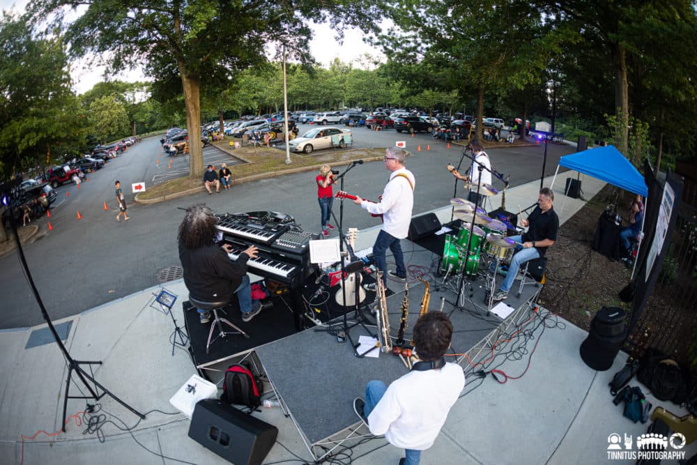 The Billy Joel tribute band Heart Attack Ack Ack Ack Ack Ack playing a concert in the parking lot of the Stoneham Zoo. (Courtesy Tinnitus Photography)