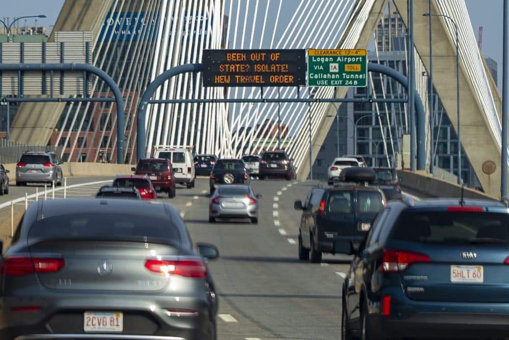 Signage on the Zakim Bridge echoed the travel order that went into effect on Aug. 1. (Jesse Costa/WBUR)