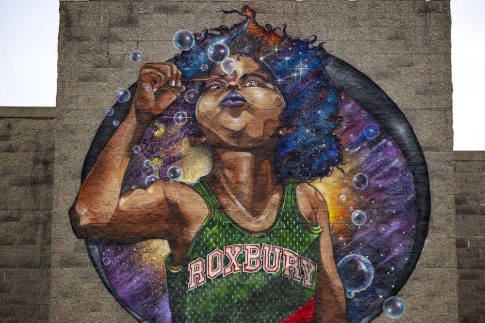 Detail of the basketball player in the &quot;Breathe Life&quot; mural at Madison Park Technical Vocational High. (Robin Lubbock/WBUR)