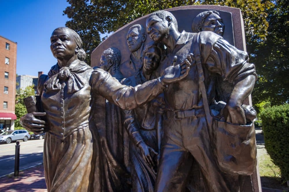 The Harriet Tubman Memorial, known as “Step on Board,” by Fern Cunningham, located in Harriet Tubman Park in the South End. (Jesse Costa/WBUR)