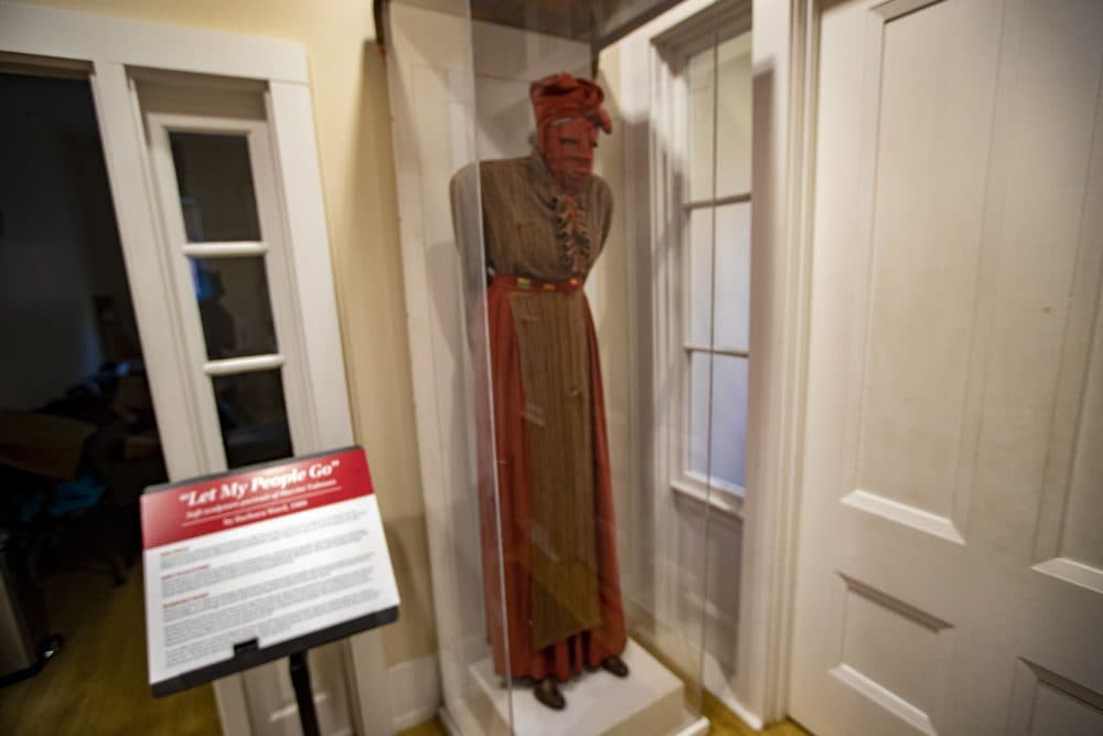 Let My People Go” is a soft sculpture portrait of Harriet Tubman by artist Barbara Ward. It's displayed at the entrance of USES. (Jesse Costa/WBUR)