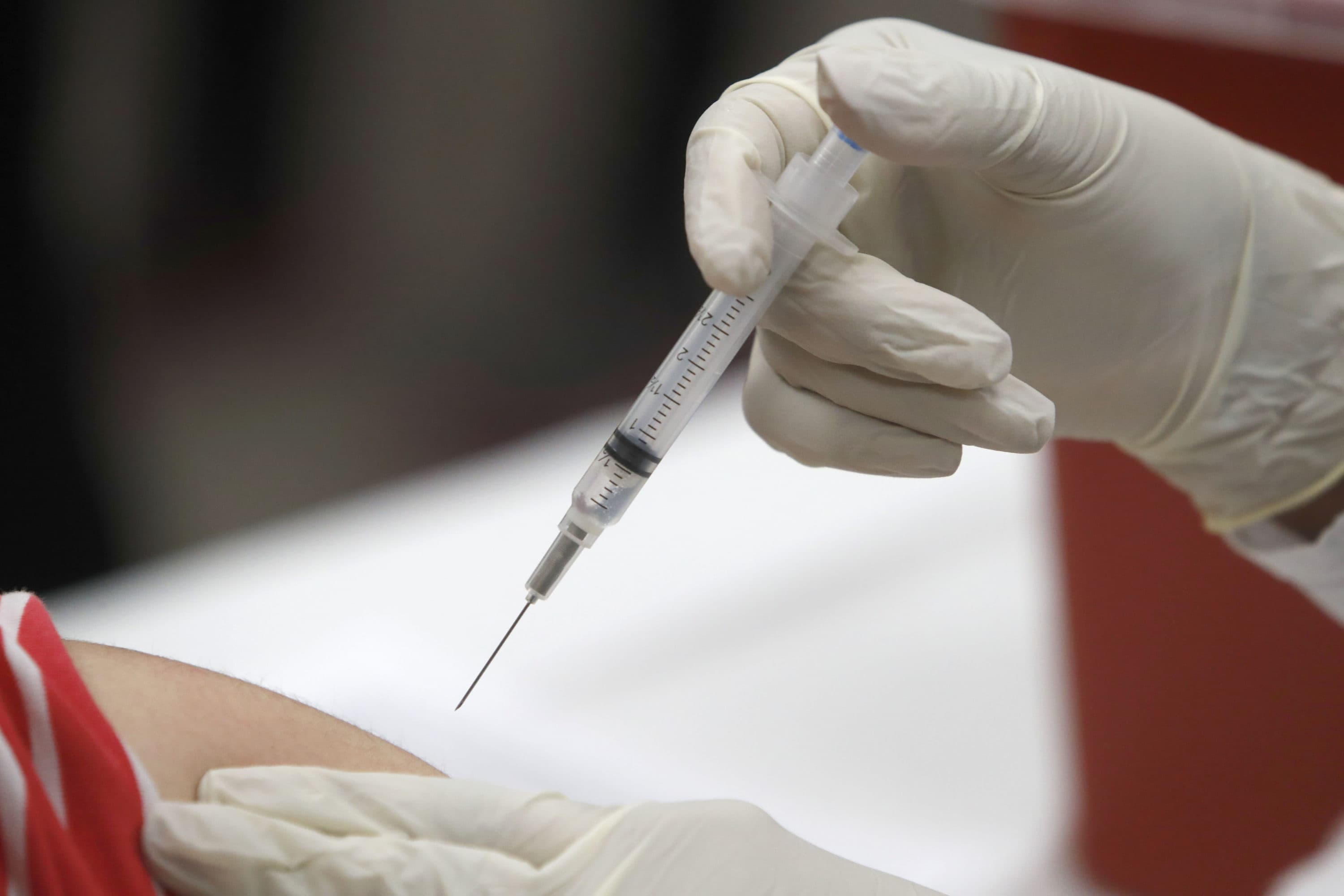In this Thursday, Jan. 23, 2020 file photo, a patient receives an influenza vaccine in Mesquite, Texas. (LM Otero/AP)
