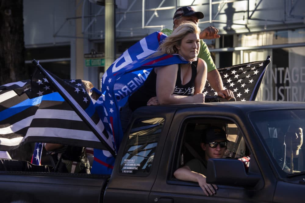 Supporters of President Donald Trump attend a rally and car parade Saturday, Aug. 29, 2020, from Clackamas to Portland, Ore. (Paula Bronstein/AP)