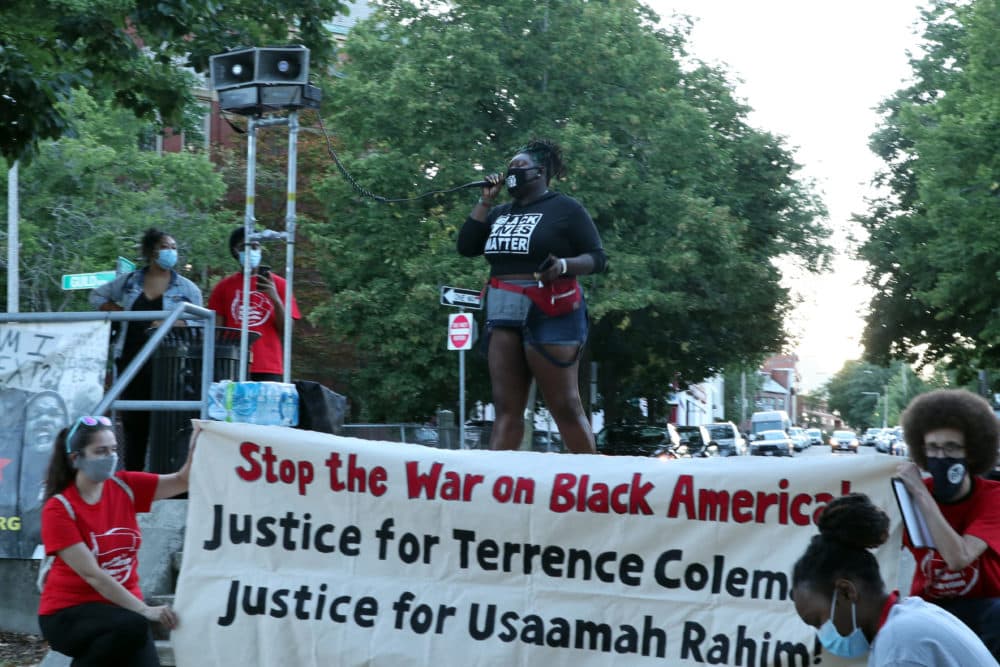 Phoenix Printemps addresses the crowd during a rally against police violence in Roxbury on Sunday, Aug. 30. (Adrian Ma/WBUR)