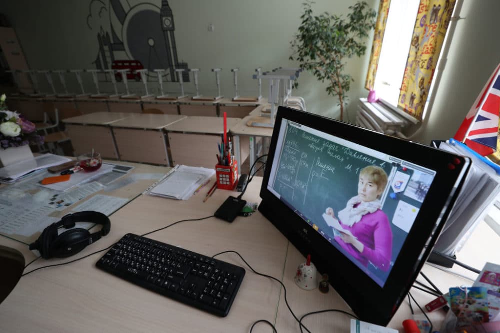 Physics teacher Liliya Daminova during an online class at a school in Kazan, Russia. Massachusetts education leaders said Friday that teachers conducting remote classes should do so from a classroom. (Yegor AleyevTASS via Getty Images)