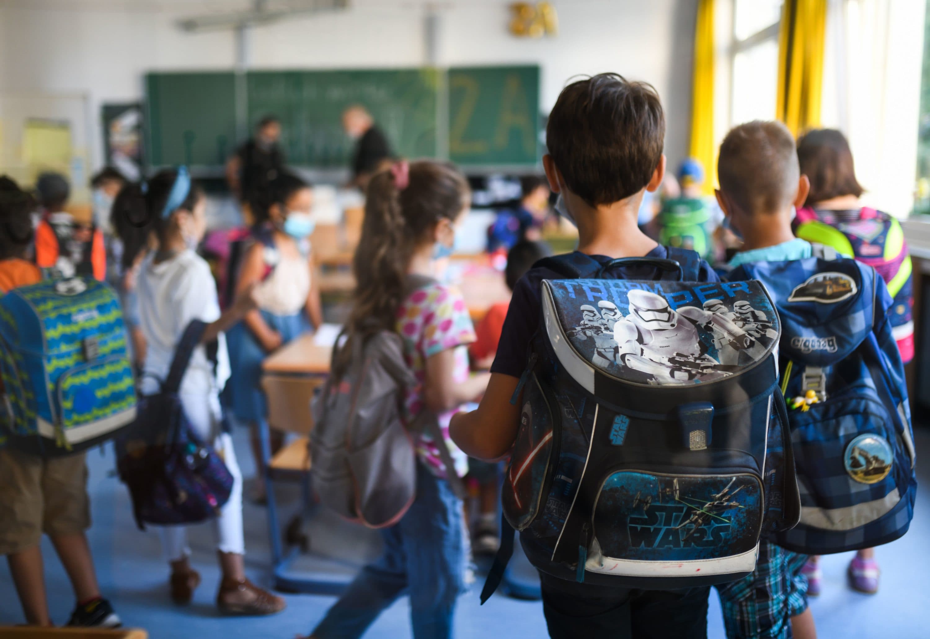 Students wear face masks in their classroom in Dortmund, Germany amid the COVID-19 pandemic. (Ina Fassbender/AFP via Getty Images)