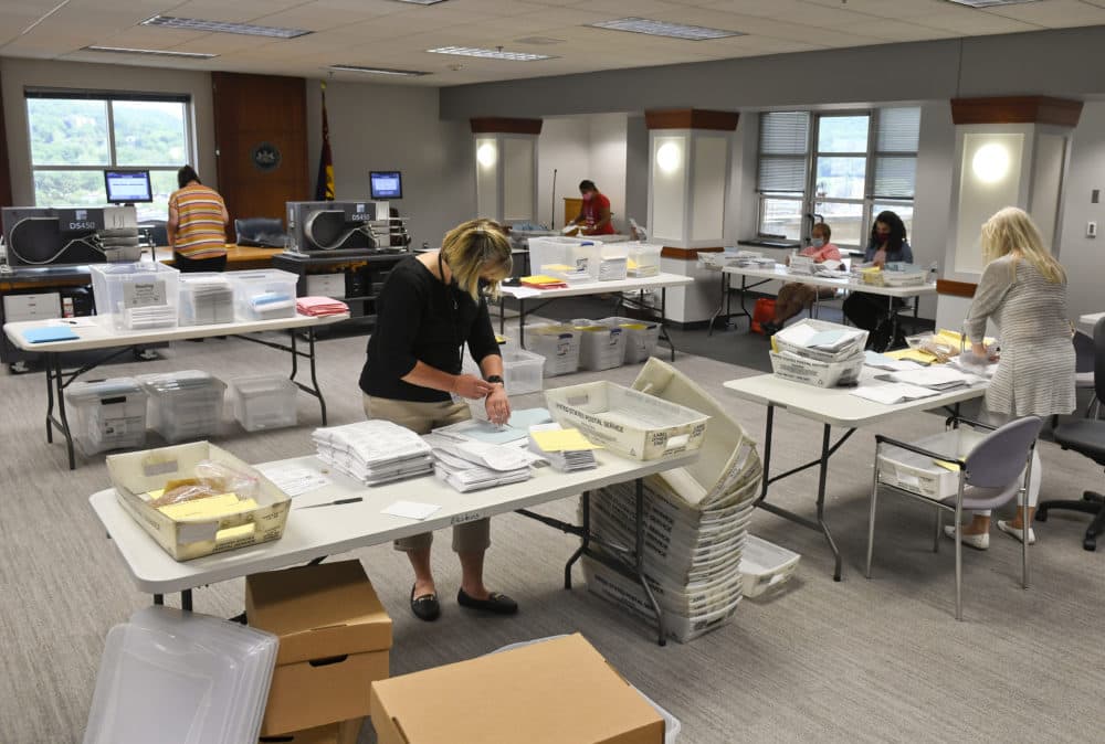 Reading, PA - June 3: On the 13ths floor of the Berks County Services Center in the Commissioners boardroom in Reading Wednesday afternoon June 3, 2020 where workers were opening and county the mail-in and absentee ballots from Tuesday's election. (Ben Hasty / Reading Eagle via Getty Images)