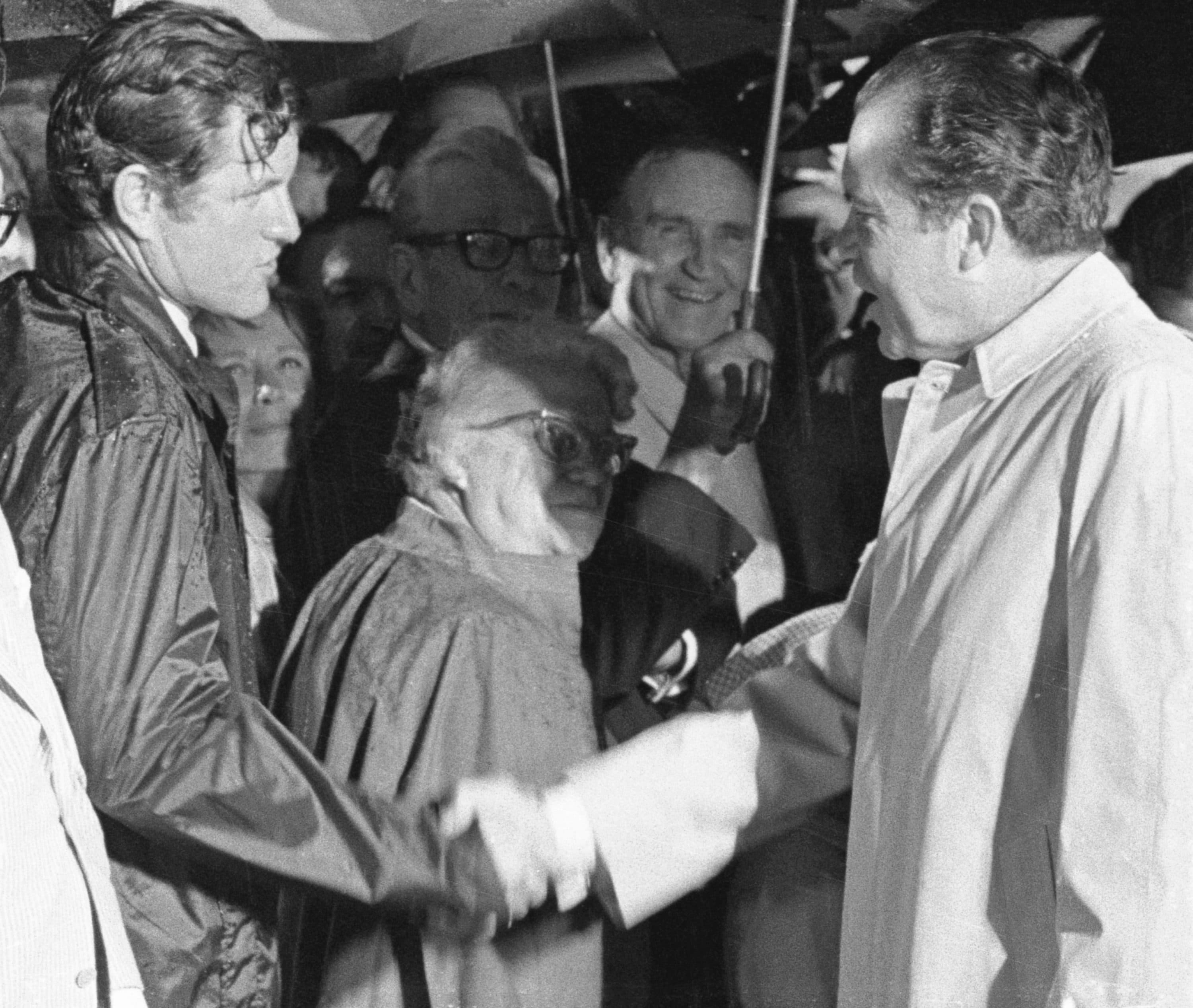 President Richard Nixon is greeted by Sen. Edward Kennedy, (D-Mass.), upon arrival at Andrews Air Force Base, August 3, 1969. (Getty Images)