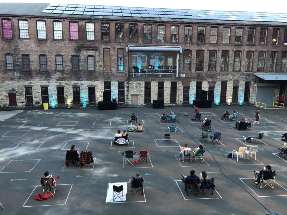 The audience gets settled before Yo La Tengo's performance at Mass MoCA. (Andrea Shea/WBUR)
