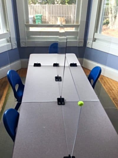 The plexiglass dividers at the lunch table at TLC Nursery School in Wayland. (Courtesy Melody Lack)