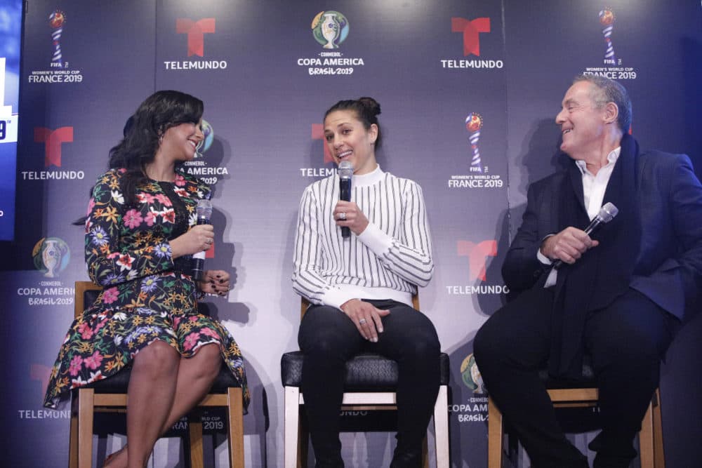 Andres Cantor with Women's World Cup players Ana Jurka and Carli Lloyd. (Lars Nikki/MSNBC/Courtesy Telemundo)