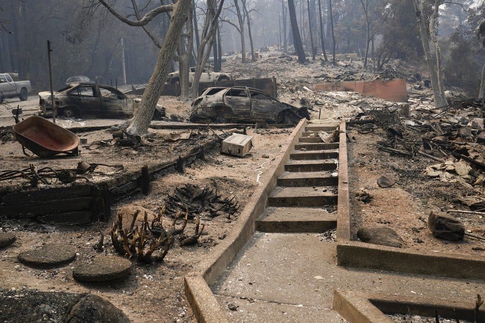 Vehicles and homes have been burned after the CZU Lightning Complex Fire went through Sunday in Boulder Creek, California. (Marcio Jose Sanchez/AP)