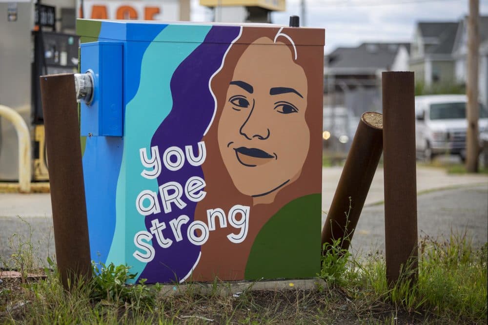 &quot;You Are Strong,&quot; painted by artist Amanda Beard Garcia on Mystic Avenue in South Medford. (Robin Lubbock/WBUR)
