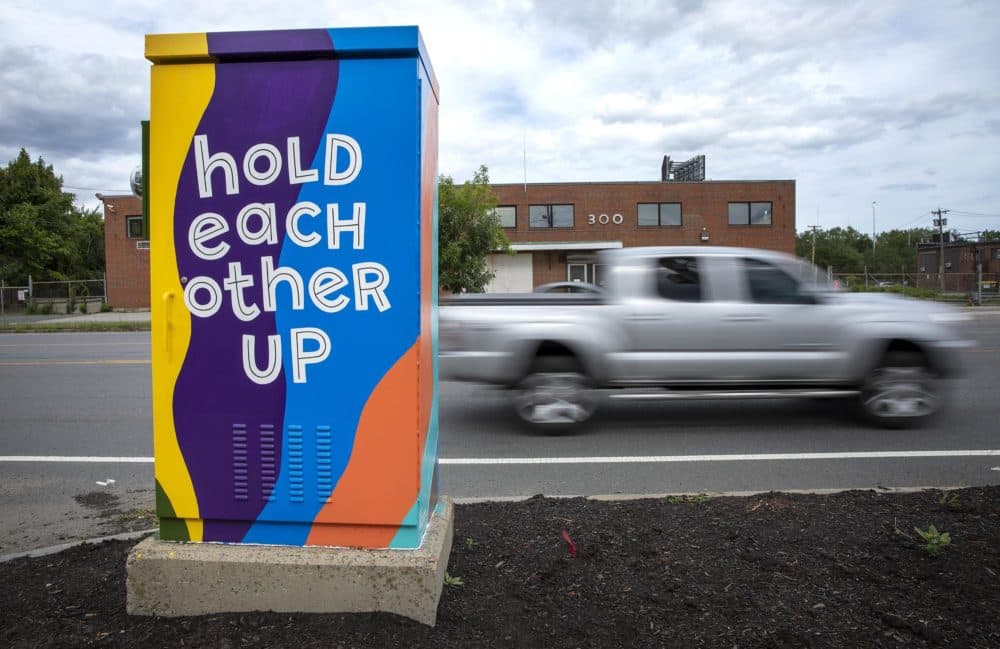 Amanda Beard Garcia's &quot;Hold Each Other Up&quot; on Mystic Avenue in South Medford. (Robin Lubbock/WBUR)