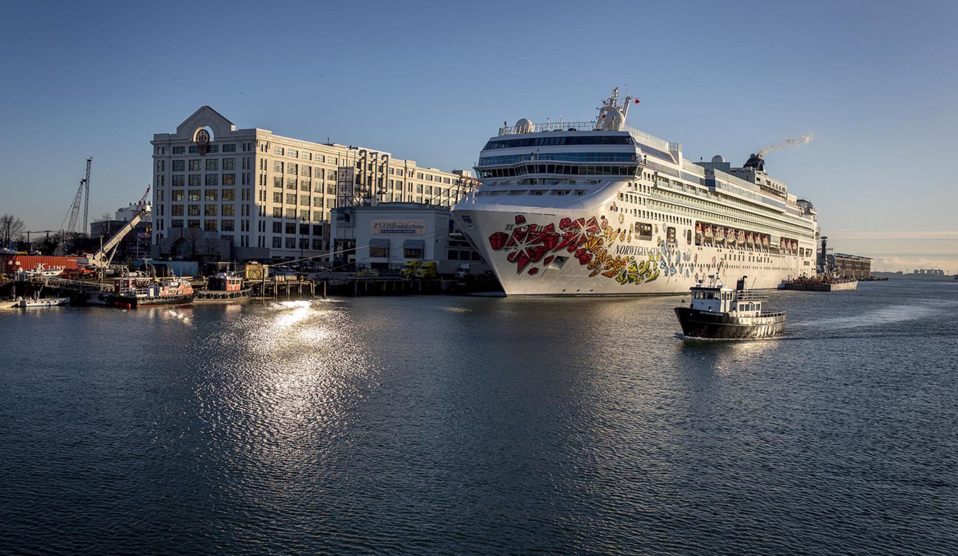 A drone shot of the Norwegian Gem docked in the South Boston cruise terminal. (Robin Lubbock/WBUR)