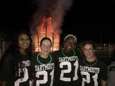 The author, second from the left, with friends at Dartmouth's homecoming bonfire. (Courtesy)