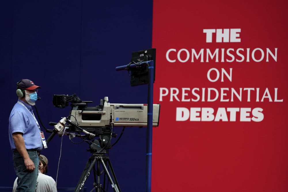 A camera operator waits for a rehearsal ahead of the first presidential debate between Republican candidate President Donald Trump and Democratic candidate former Vice President Joe Biden at the Health Education Campus of Case Western Reserve University, Monday, Sept. 28, 2020, in Cleveland. (Julio Cortez/AP)