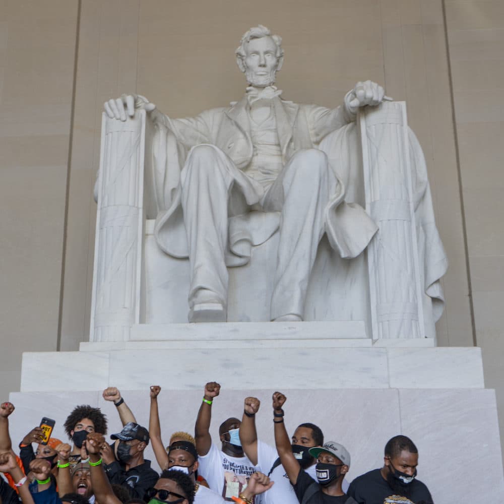 Family and friends of George Floyd gather at the foot of the Lincoln Memorial. (OJ Slaughter for WBUR)