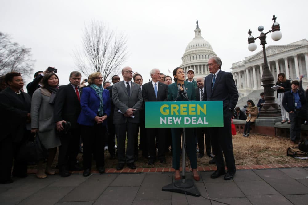 U.S. Rep. Alexandria Ocasio-Cortez (D-NY) speaks as Sen. Ed Markey (D-MA) (R) and other Congressional Democrats listen during a news conference in front of the U.S. Capitol February 7, 2019 in Washington, DC. Sen. Markey and Rep. Ocasio-Cortez held a news conference to unveil their Green New Deal resolution. (Alex Wong/Getty Images)