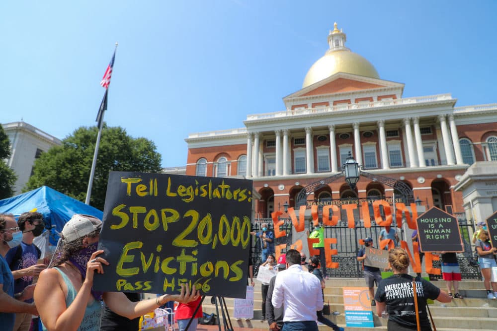 Protesters gather at a rally in support of bills and legislation to block evictions in Massachusetts for up to a year in front of the Massachusetts State House in Boston on July 22, 2020. (Matthew J. Lee/The Boston Globe via Getty Images)