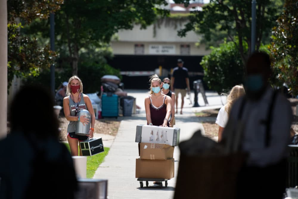 Students move belongings into a campus dormitory at the University of South Carolina on August 10, 2020 in Columbia, South Carolina. (Sean Rayford/Getty Images)
