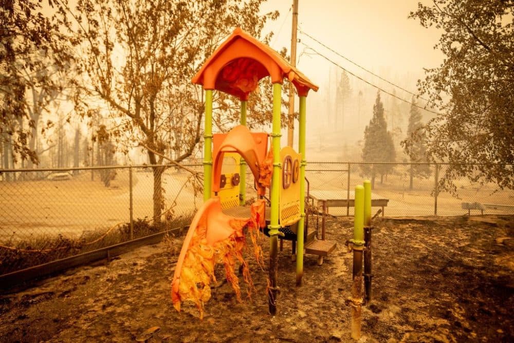 A melted slide smolders as a playground continues to burn during the Creek Fire in California on September 8, 2020. (Josh Edelson/AFP/Getty Images)