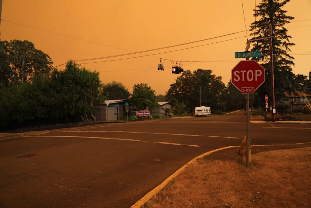 An orange smoke-filled sky is seen above Estacada, Oregon, on September 9, 2020, as fires burn nearby.  (Deborah Bloom/AFP via Getty Images)