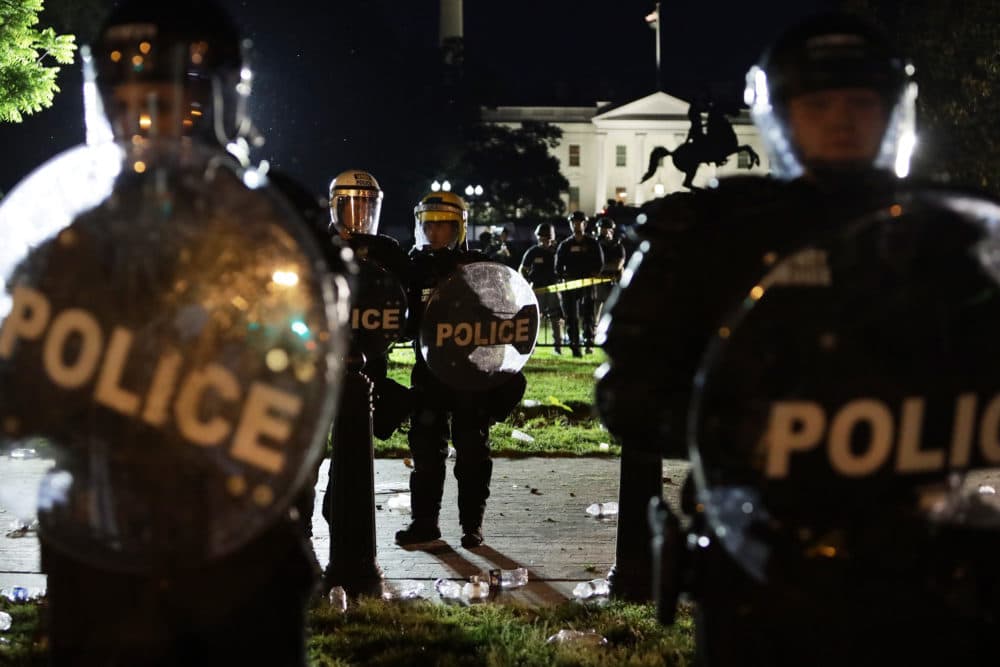 Members of the U.S. Secret Service hold a perimeter near the White House as demonstrators gather to protest the killing of George Floyd on May 30, 2020 in Washington, DC. (Alex Wong/Getty Images)