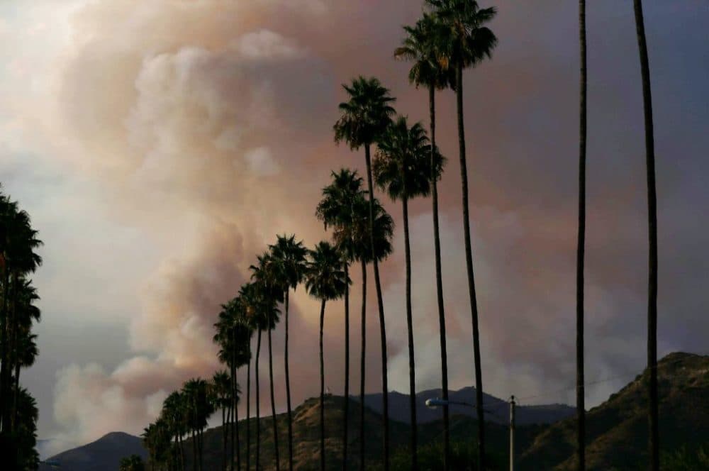A plume of smoke rises from the Ranch 2 Fire on August 15, 2020 as seen from Azusa, California. (Mario Tama/Getty Images)