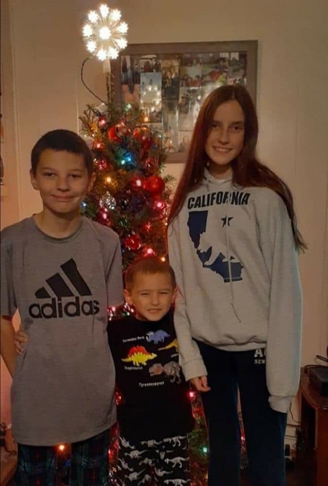 Nikki Collins with her brothers, Clayton and Troy. (Courtesy)