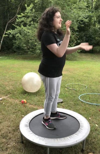 Sabrina Budd exercises on a trampoline in her yard. (Courtesy, the Budd family)