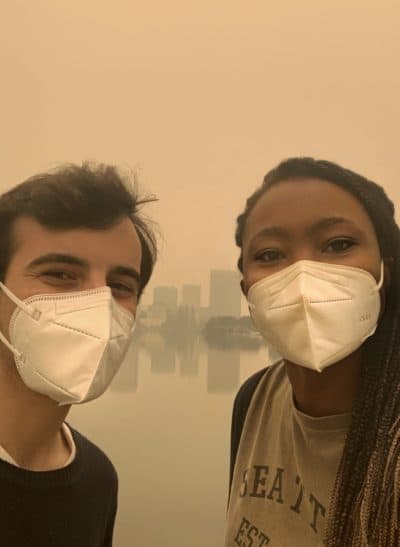 Adamma Izuegbunam (right) and fellow volunteer Dennis Uyat Franco (left) handing out masks around Lake Merritt in Oakland, California. (Courtesy)