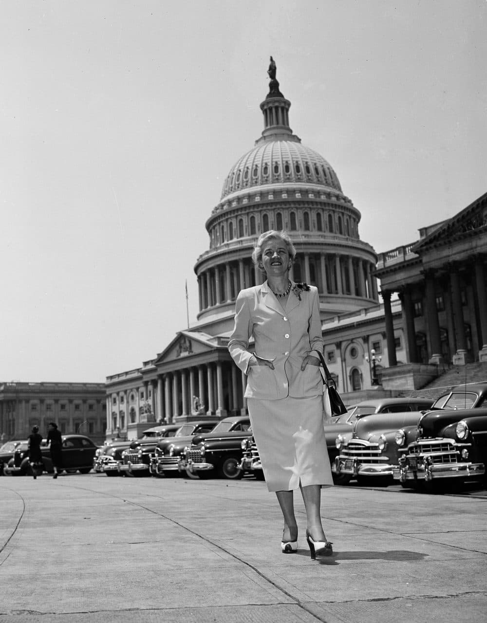 Senator Margaret Chase Smith (R-Maine) walks in the capitol plaza with the Capitol in the background, June 14, 1950, in Washington D.C. (Herbert K. Smith/AP)