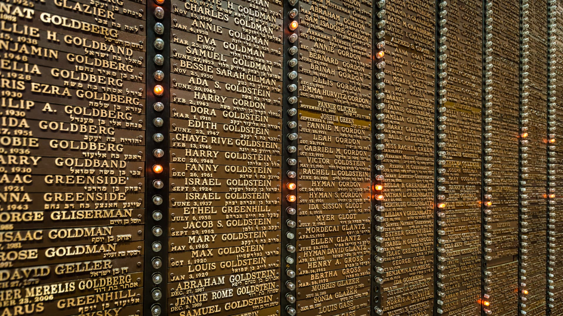 The names of residents and family members who have died are memorialized on the walls of the synagogue. (Courtesy Randall Armor)