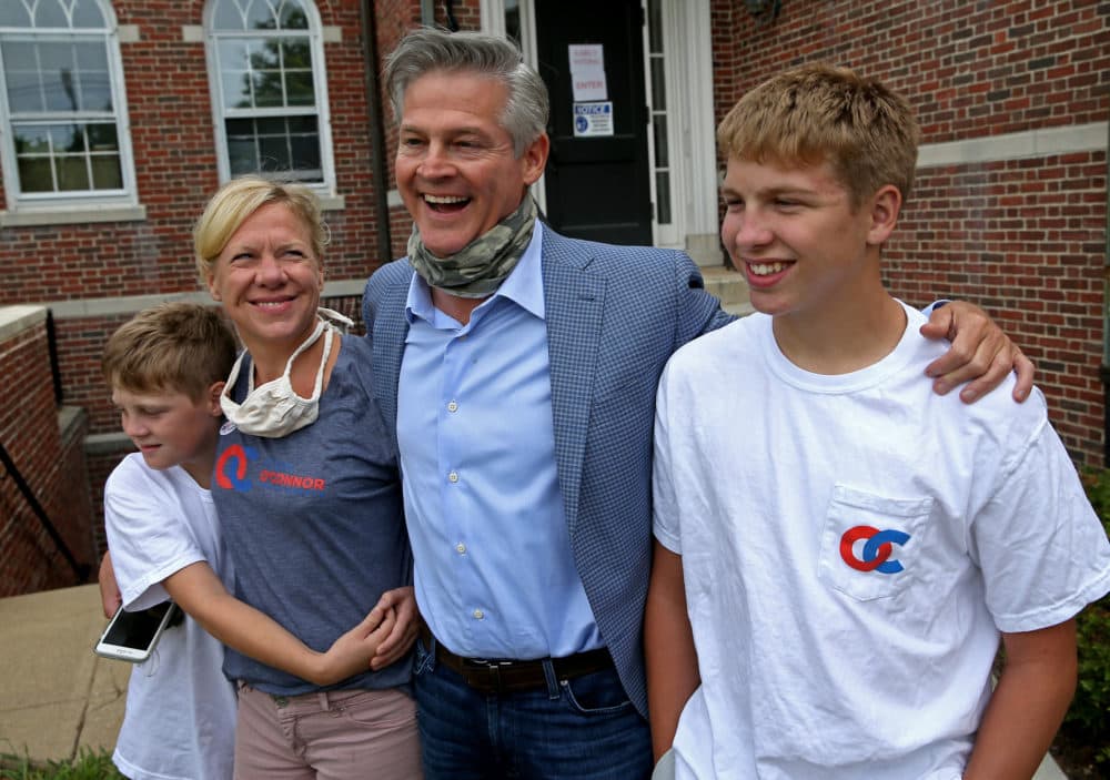 Kevin O'Connor who's running for U.S. Senate as the Republican with his family, Matt, 13, Kyle, 9, and his wife, Janet, at the Dover Town Hall after casting his vote on Aug. 26, 2020. (Matt Stone/ MediaNews Group/Boston Herald via GettyImages)