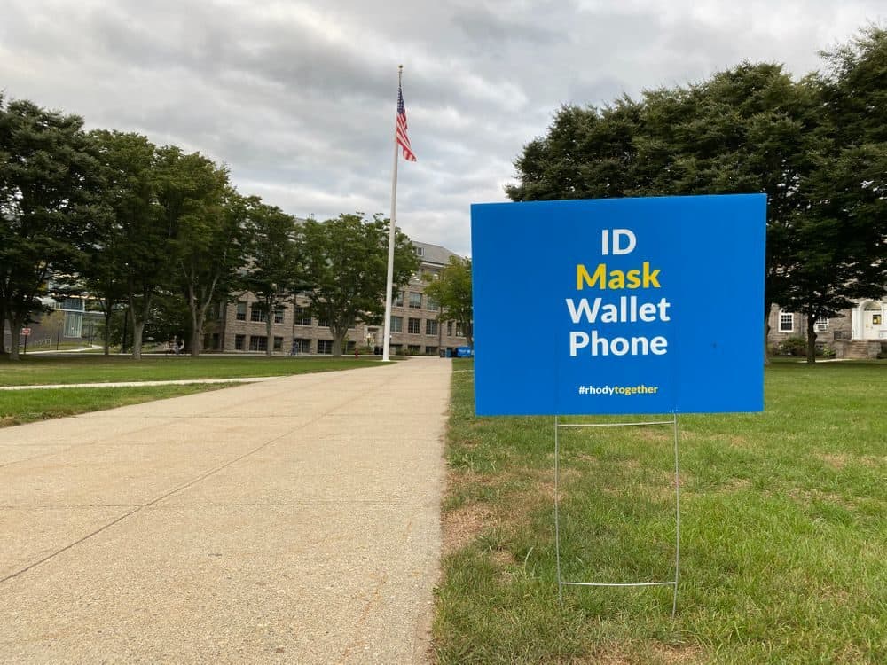 A sign on the URI campus on Friday reminds students to wear a mask. (Julio Moro/The Public's Radio)A sign on the URI campus on Friday reminds students to wear a mask. (Julio Moro/The Public's Radio)