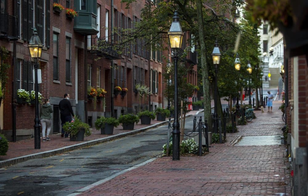 Gas streetlamps on Temple Street in the early evening. (Robin Lubbock/WBUR)