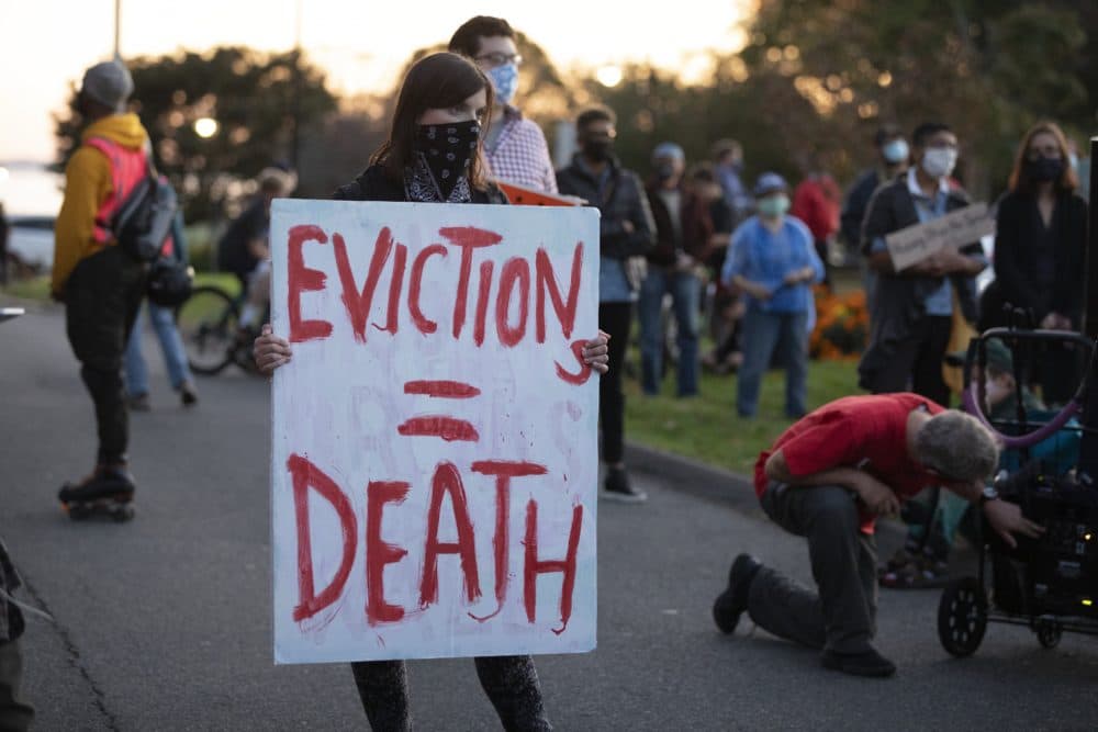 The protesters were calling on the governor to support more robust protections against evictions and foreclosures during the ongoing coronavirus pandemic. (Michael Dwyer/AP)
