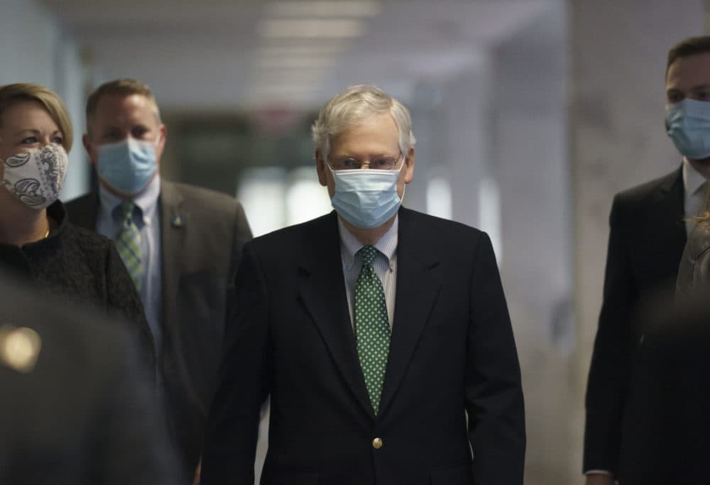 Senate Majority Leader Mitch McConnell, R-Ky., arrives as Republicans work during a rare weekend session to advance the confirmation of Judge Amy Coney Barrett to the Supreme Court, at the Capitol in Washington, Sunday, Oct. 25, 2020. (J. Scott Applewhite/AP)
