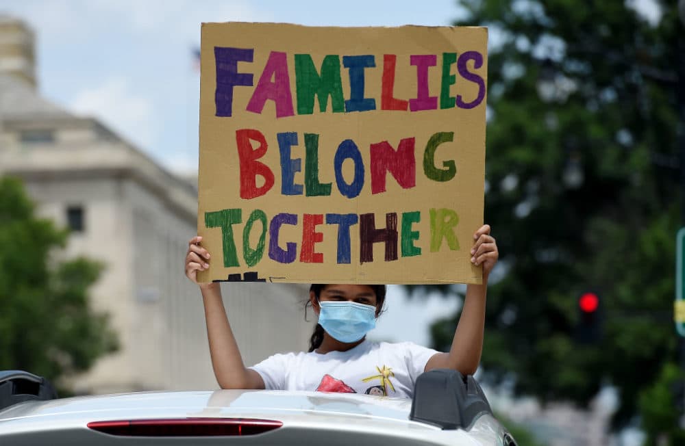 Demonstrators protest outside the Immigration and Customs Enforcement (ICE) headquarters to demand the release of immigrants families in detention centers at risk during the coronavirus pandemic, in Washington, DC, on July 17, 2020. (Olivier Douliery/AFP via Getty Images)