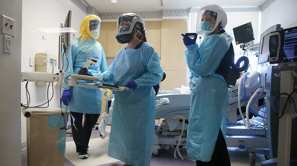 Clinicians care for a COVID-19 patient in the Intensive Care Unit (ICU) at El Centro Regional Medical Center in hard-hit Imperial County on July 21, 2020 in El Centro, California. (Mario Tama/Getty Images)