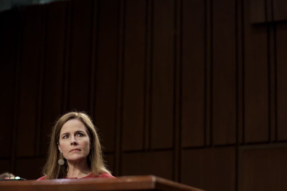 Supreme Court nominee Judge Amy Coney Barrett arrives to testify before the Senate Judiciary Committee on the second day of her Supreme Court confirmation hearing on Capitol Hill on October 13, 2020 in Washington, DC. Barrett was nominated by President Donald Trump to fill the vacancy left by Justice Ruth Bader Ginsburg who passed away in September. (Samuel Corum/Getty Images)