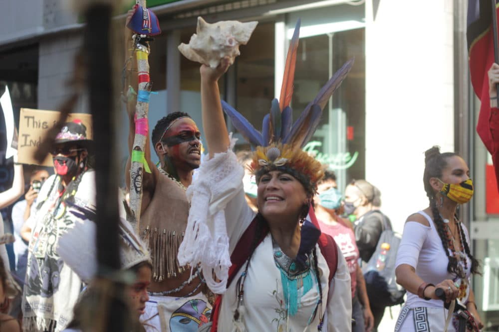 Chali'Naru Dones and other protesters call for Indigenous Peoples' Day to replace Columbus Day in Boston.
