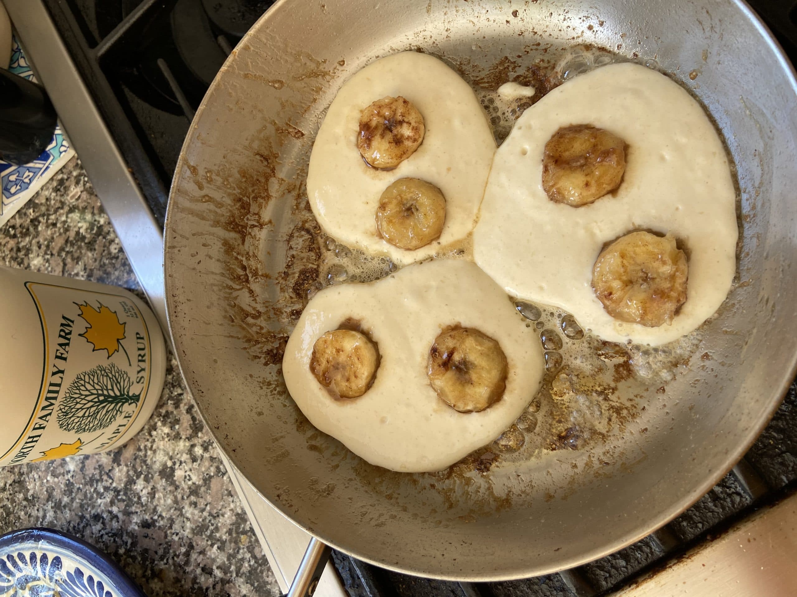 Maple-banana pancakes in a skillet. (Kathy Gunst)