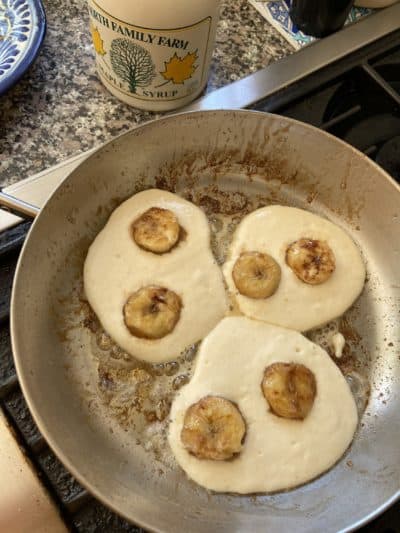 Maple-banana pancakes in a skillet. (Kathy Gunst)