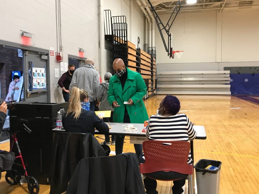 Congresswoman Ayanna Pressley casts her ballot early at the Shelburne Community Center in Roxbury. (Quincy Walters/WBUR)