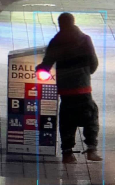 A surveillance image, released by Boston police, of the person suspected of igniting a ballot drop box. (Courtesy Boston Police Department)